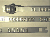 Goedgekeurde stalen bandverzegeling met alfanumeriek identificatiekenmerk NL DOUANE 005507832